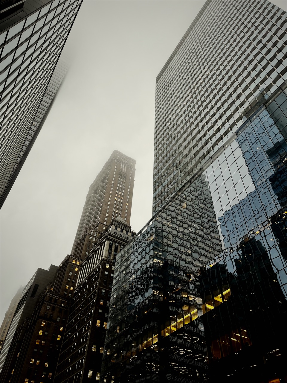 Skyscrapers disappearing into fog